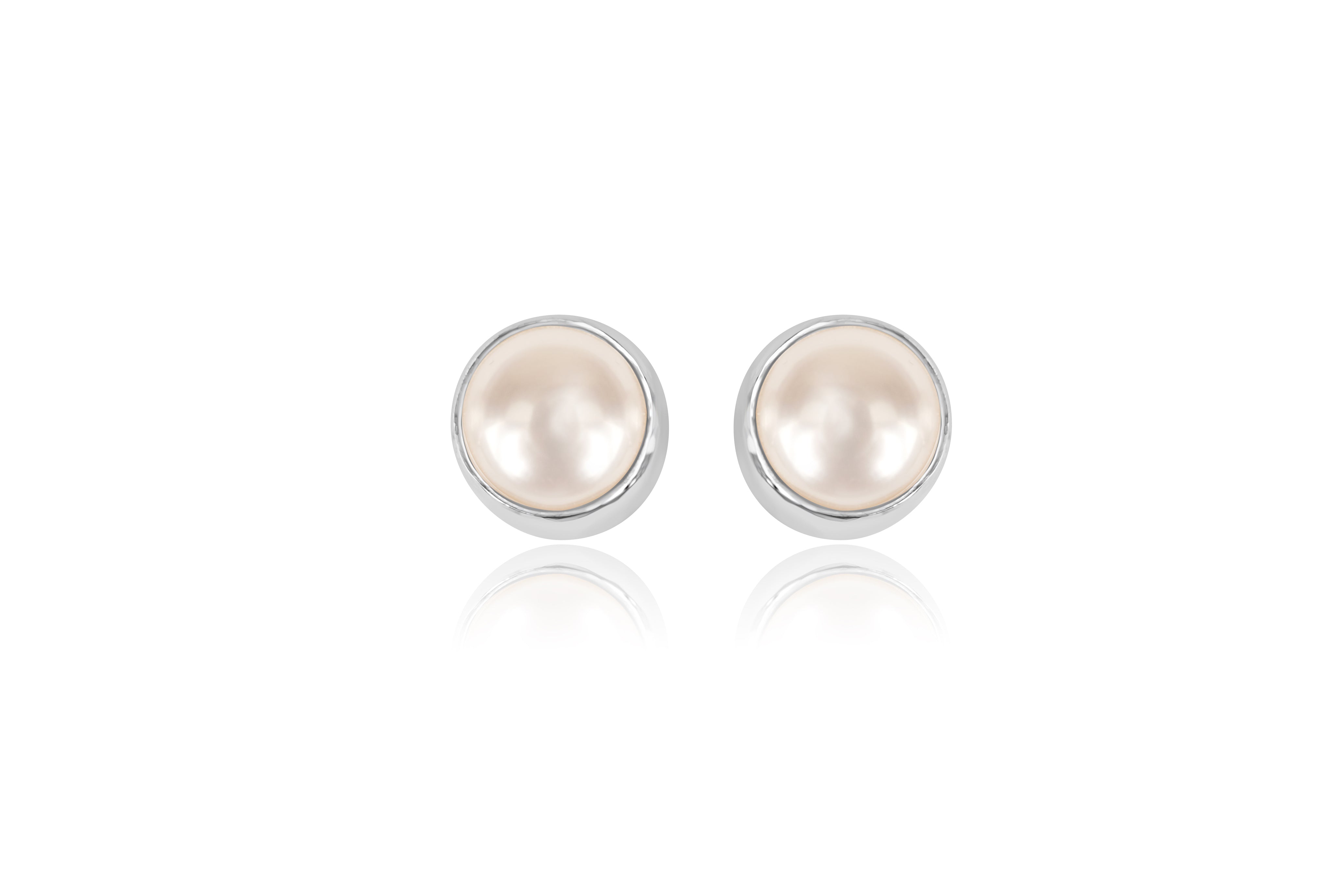 jdavis Collection. White Single Pearl Earrings